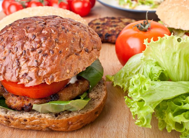 burger on a whole wheat bun with vegetables