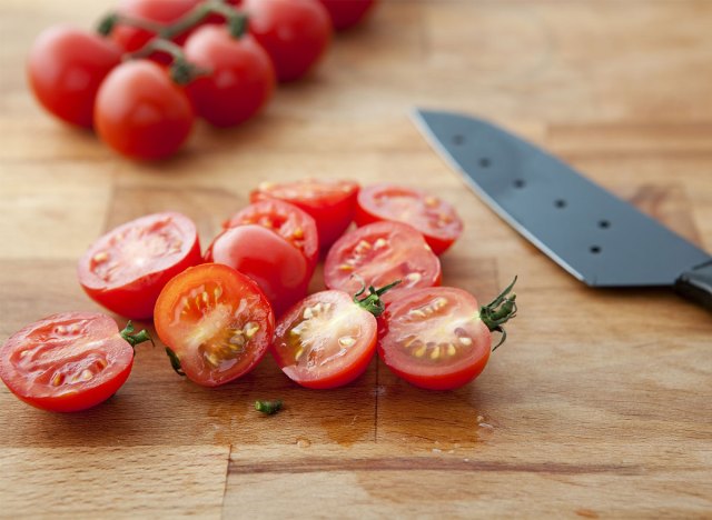 40 suggestions for males who need to lose weight after 40 189 halved cherry tomatoes with knife on cutting board