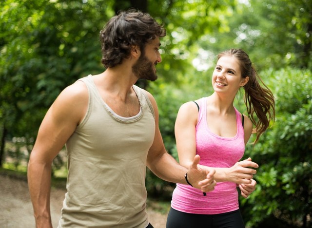 what occurs to your physique when you stroll each day 29 couple walking in park