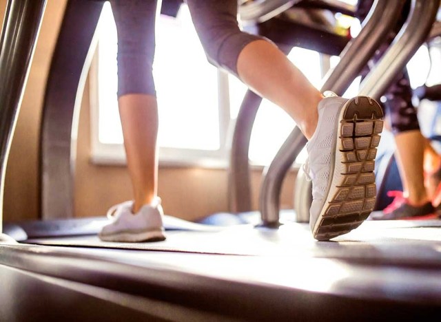 woman running on treadmill