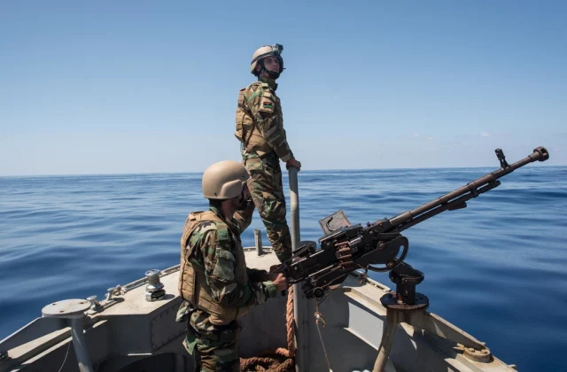 Coast Guard official accused of having smuggled immigrants arrested