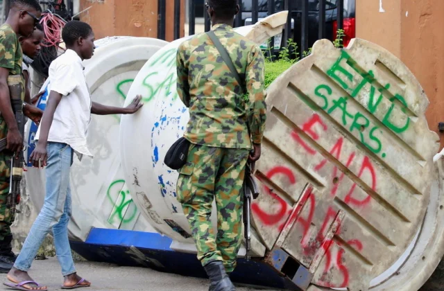 Nigeria’s Buhari says dozens have died in unrest following protests towards police abuse