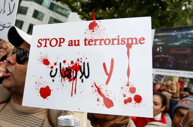 Tunisians are calling for the prosecution of lawmakers who condoned the murder of a French teacher