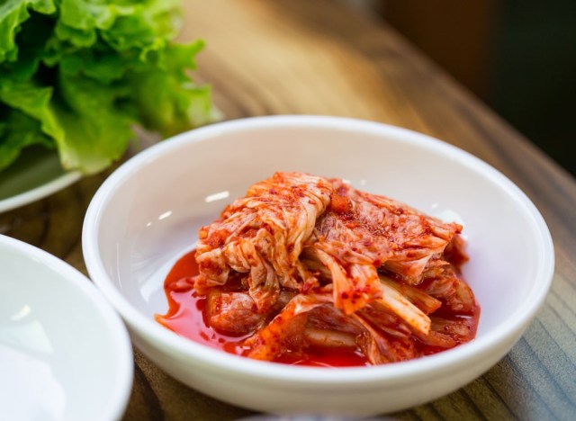 lose your intestine: 50 meals that assist soften stomach fats 291 kimchi in white bowl
