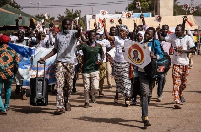 a non-governmental organization condemns the distribution of campaign devices