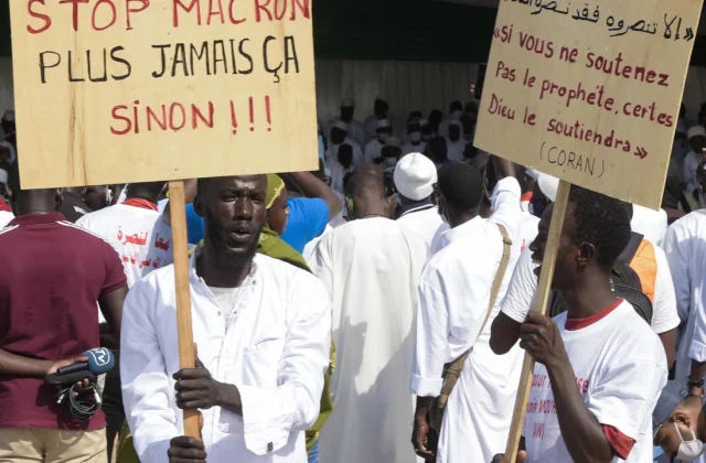 thousands of protesters against Muhammad’s caricatures