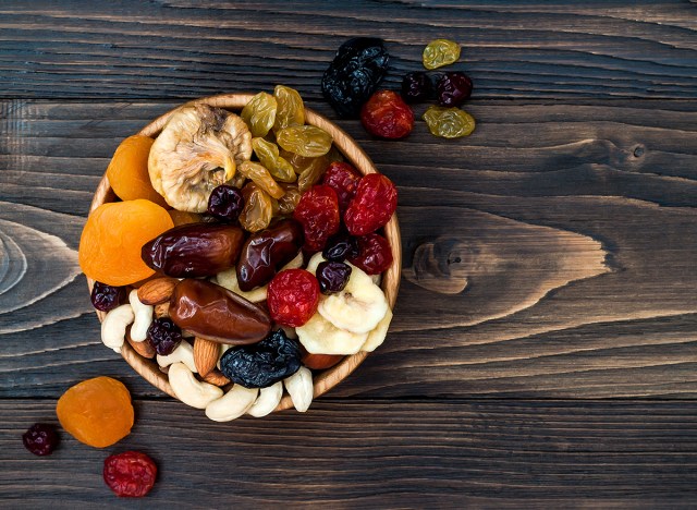 dried fruit nuts in wooden bowl