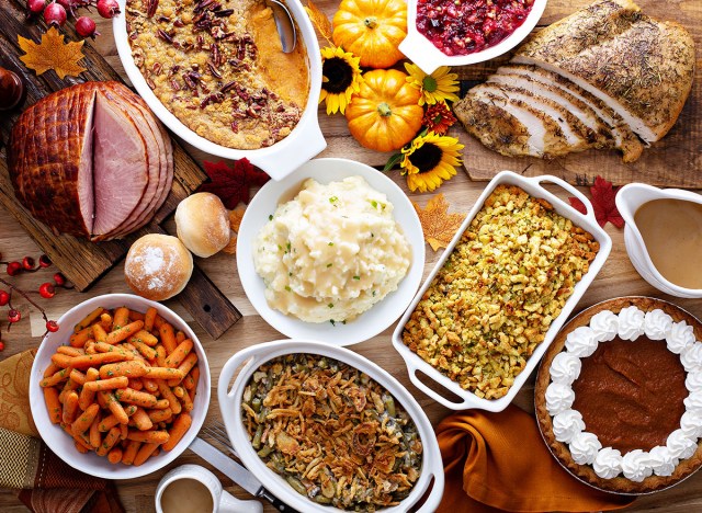 thanksgiving table with turkey and sides