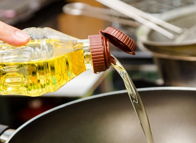 pour rapeseed oil into the pan