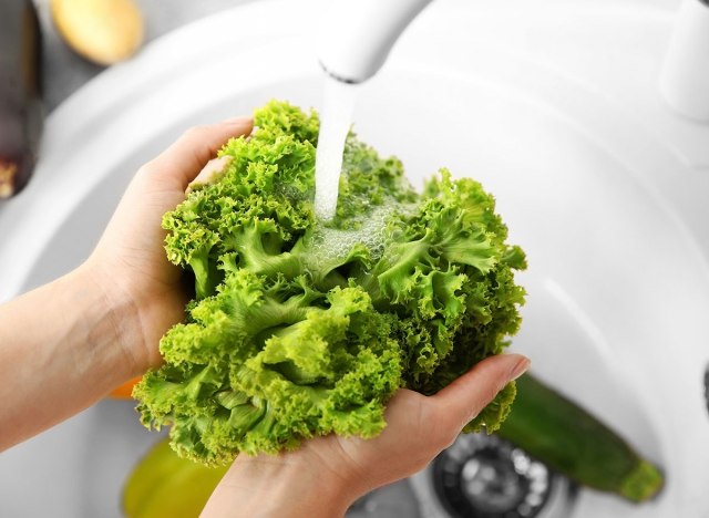 women washing salad