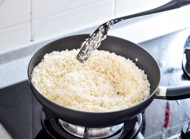 stirring the rice cooker