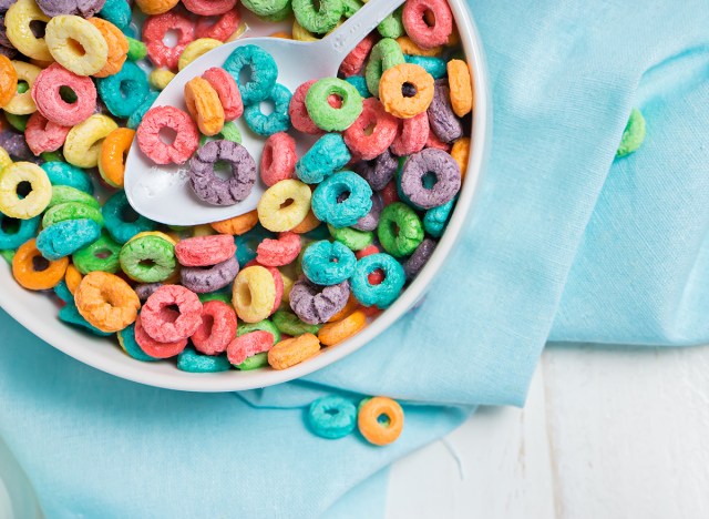 colorful sweet baby flakes in white bowl on blue towel