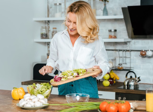 healthy woman making salad