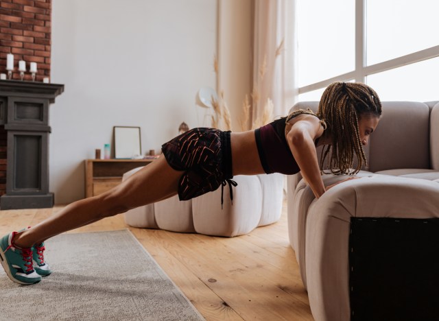 woman doing pushups at home