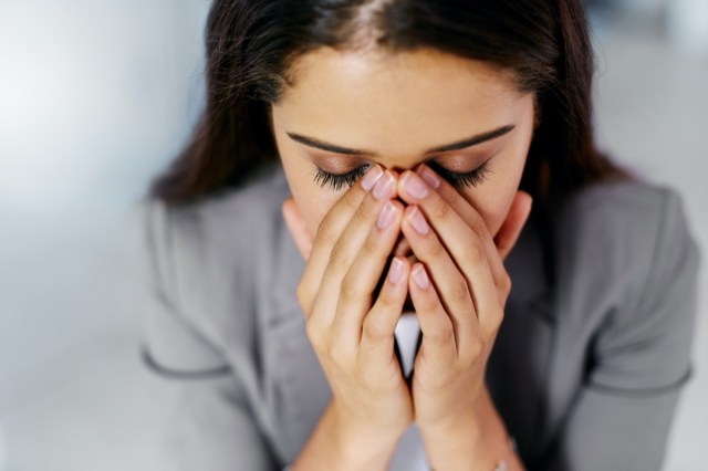 woman stressed out in an office