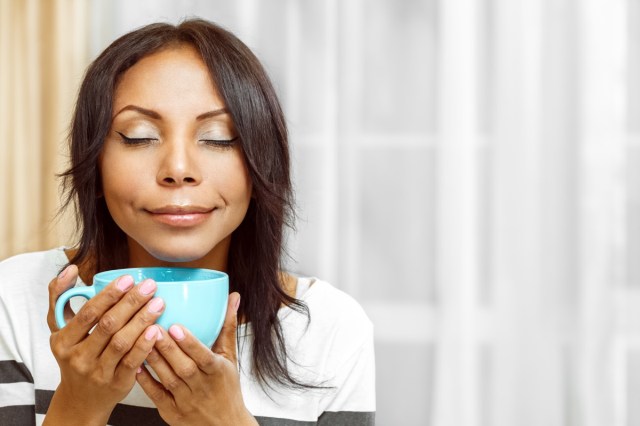 woman enjoying coffee in the morning