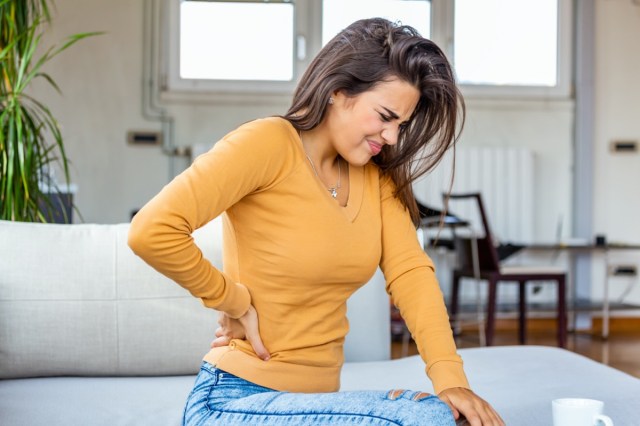 woman having spinal or kidney pain