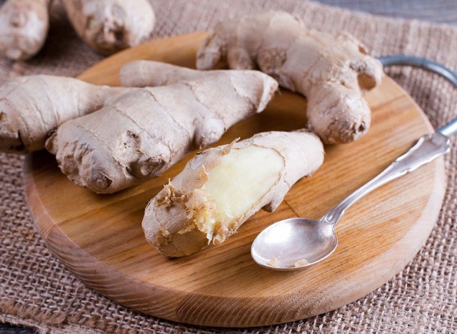 peeling ginger using a spoon