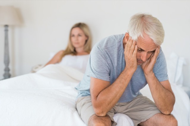 worried senior man in tension at bed.