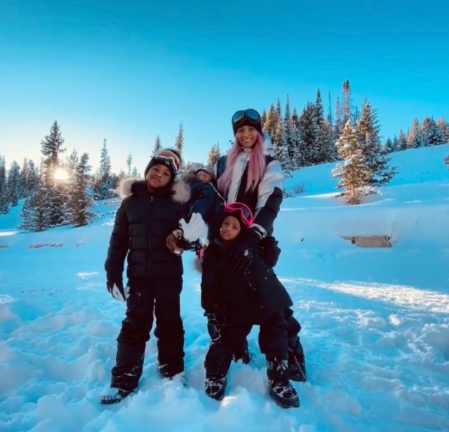 ciara and her three children riding in black and white clothes