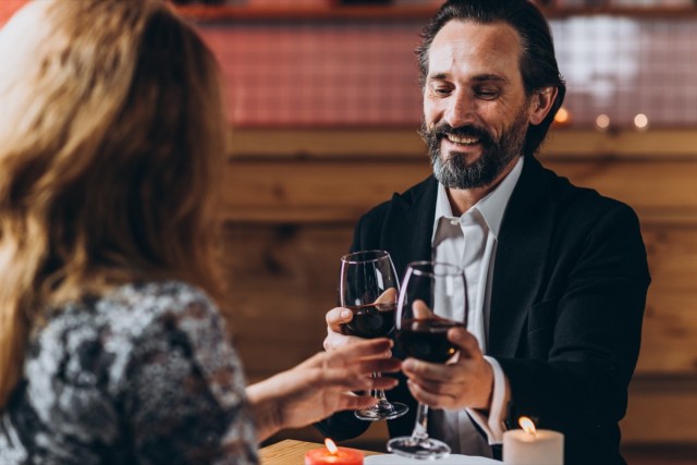 middle-aged loving couple have a romantic dinner