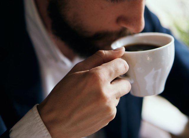 man drinking coffee