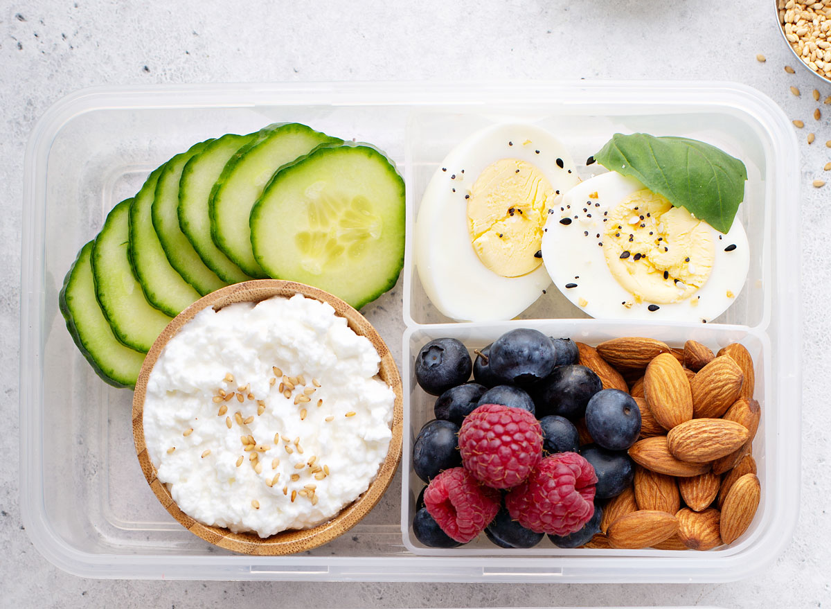 breakfast bento box high protein with hard boiled eggs fruit nuts cottage cheese cucumber