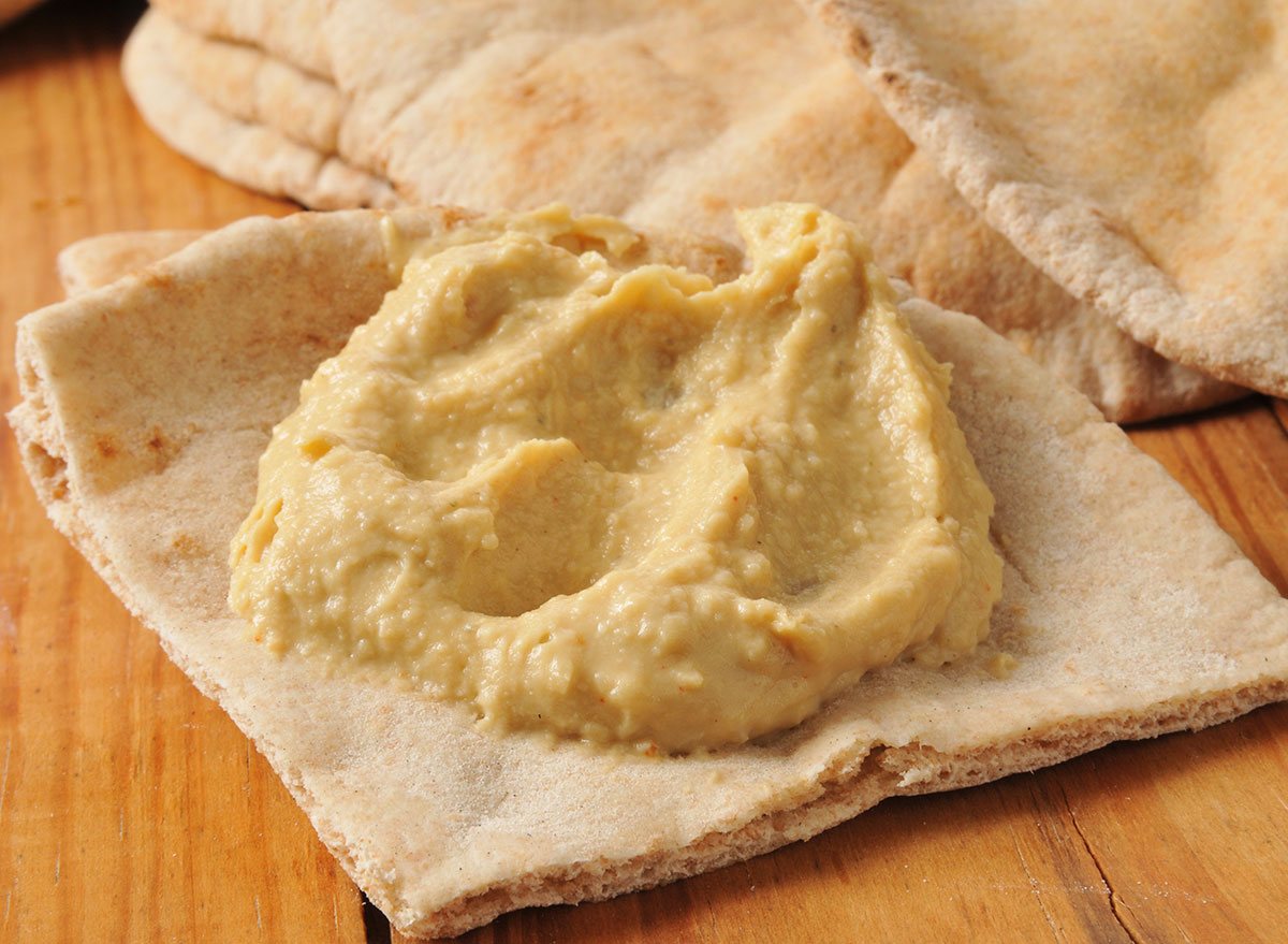 12 best snacks that crush hunger cravings 54 garlic hummus pita