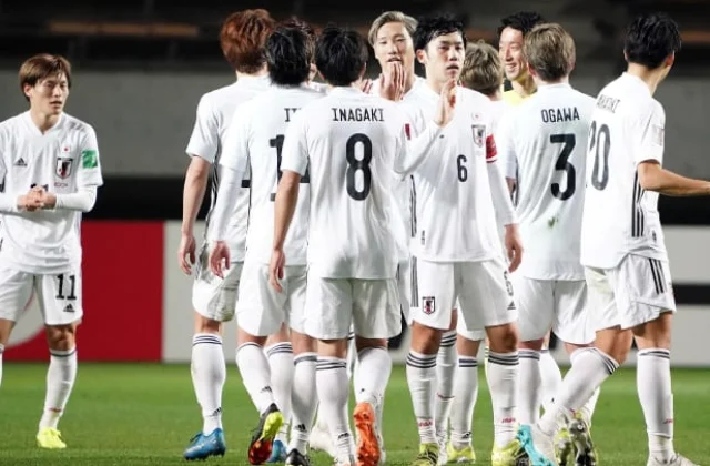 Takumi Minamino scores when Japan beat Mongolia 14-0