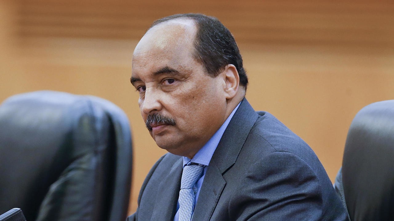 former President Aziz threatened by