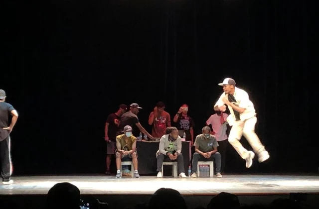 the massive annual assembly with hip dancers