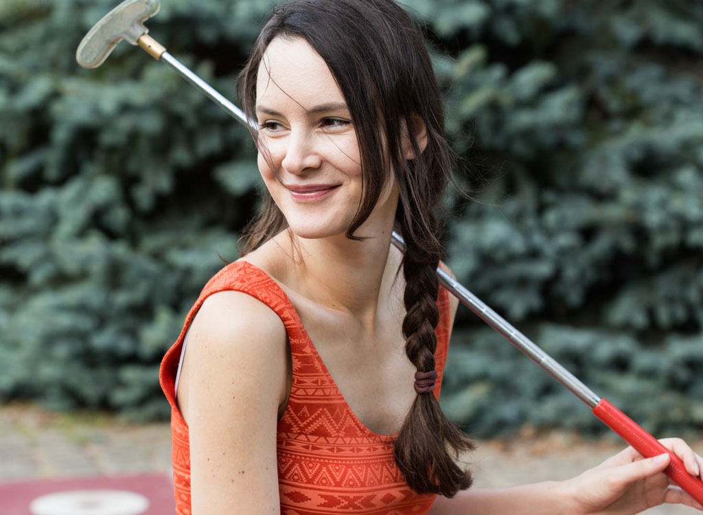 woman happy mini golf