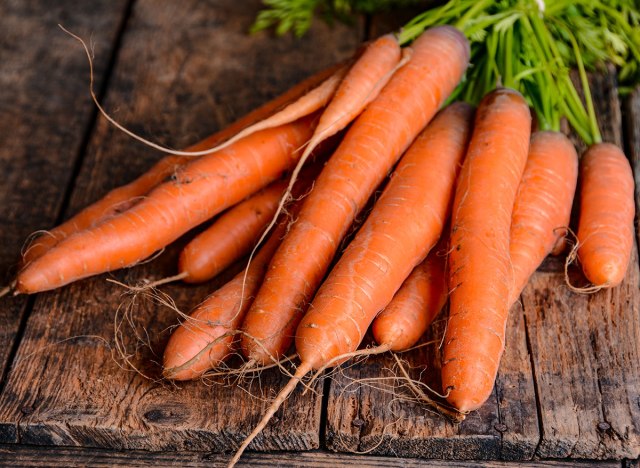 organic carrots on wood