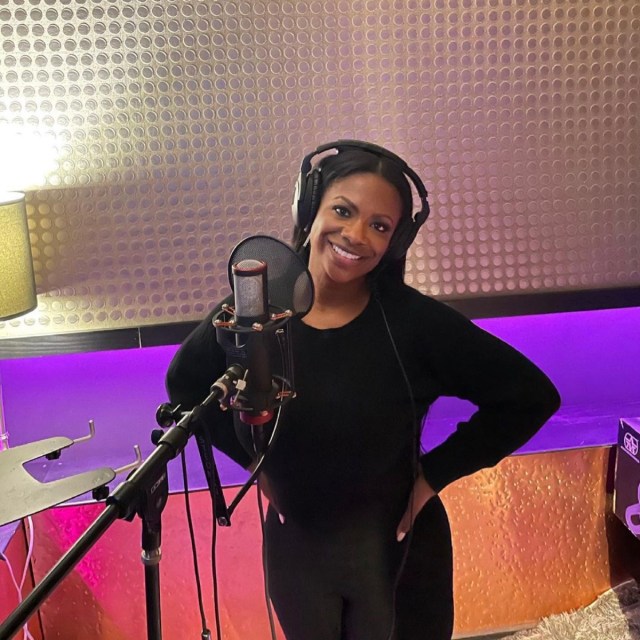 kandi burruss in black outfit in the recording studio