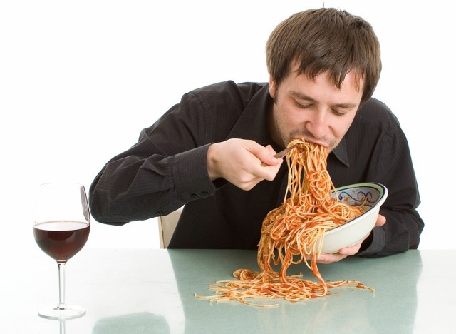 best worst foods sleep - person eating too much pasta