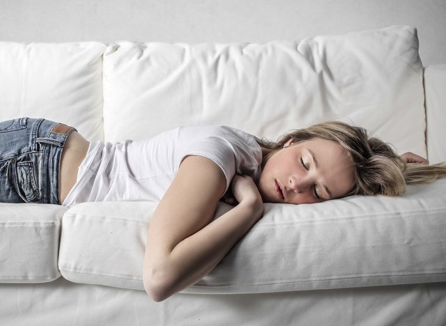 girl napping - best ways to speed up your metabolism 