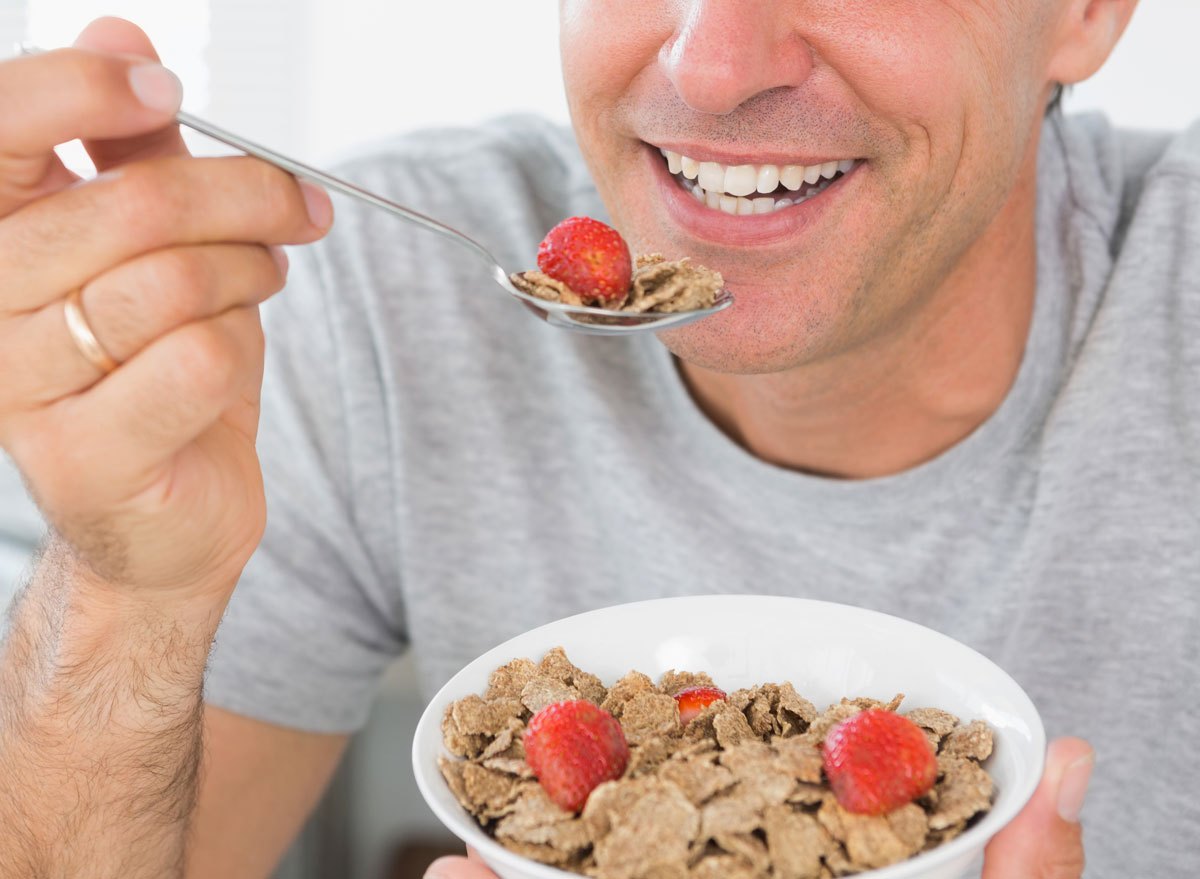 man eating high fiber breakfast cereal