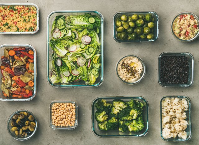 vegetarian vegan meal prep with vegetables beans salad olives hummus