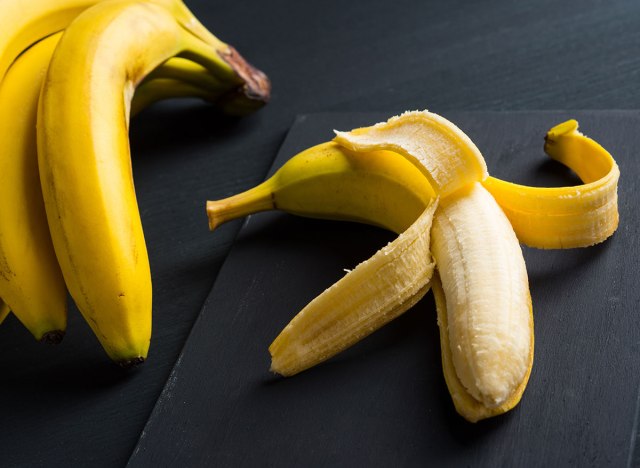 peeling a banana from the bottom