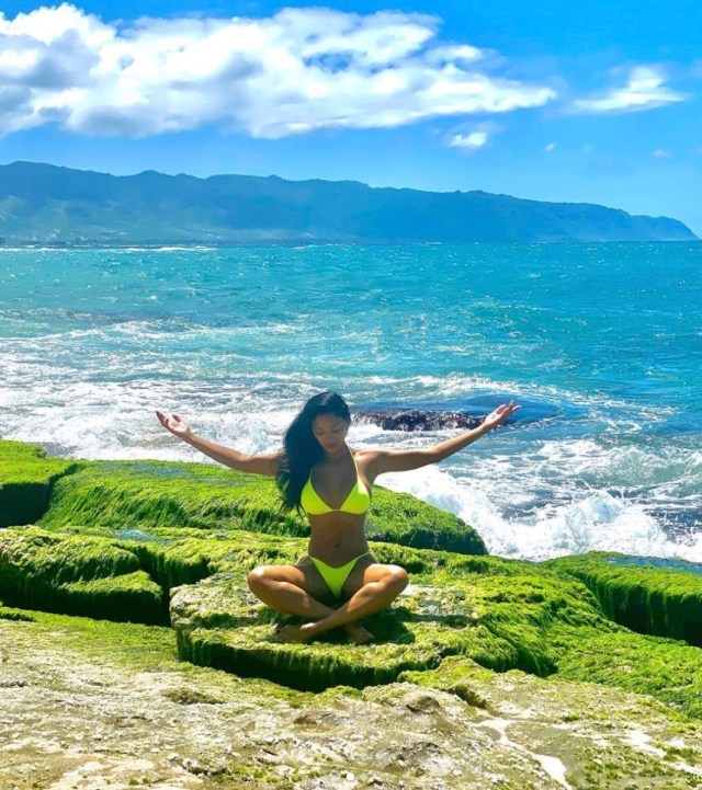 nicole scherzinger stretching in green bikini on beach