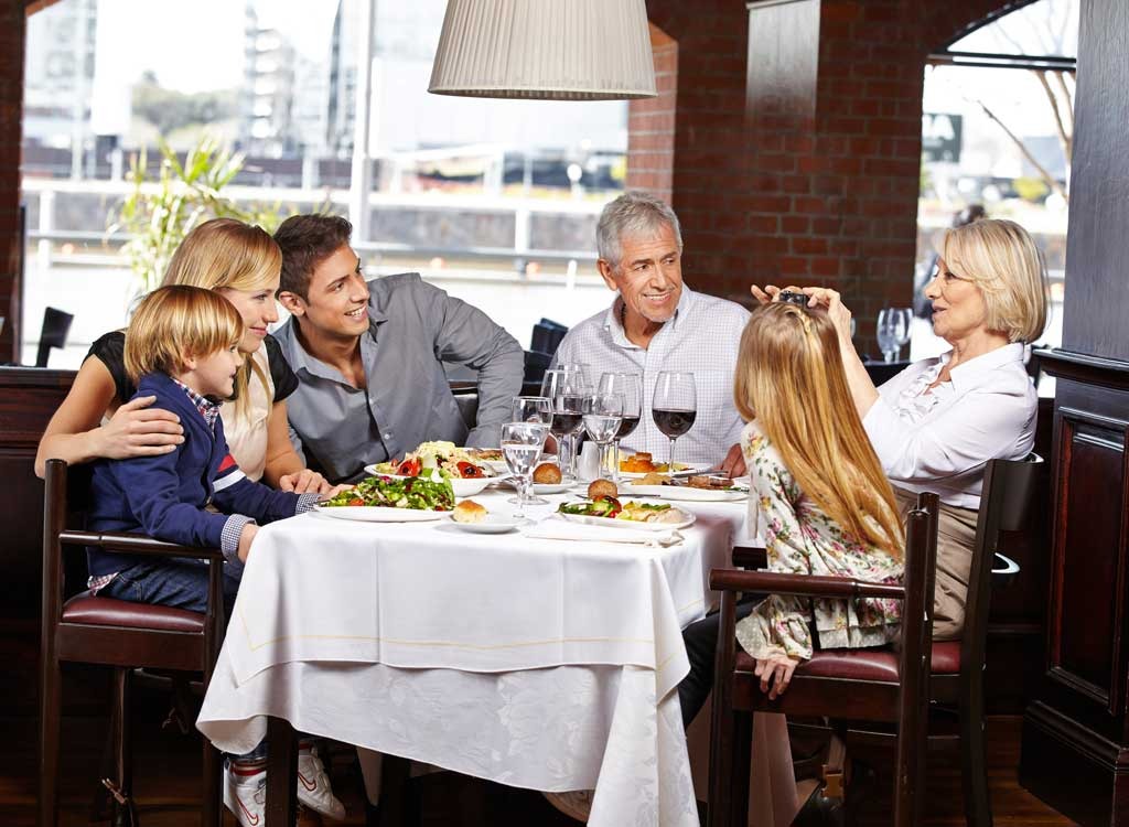 family in restaurant picture