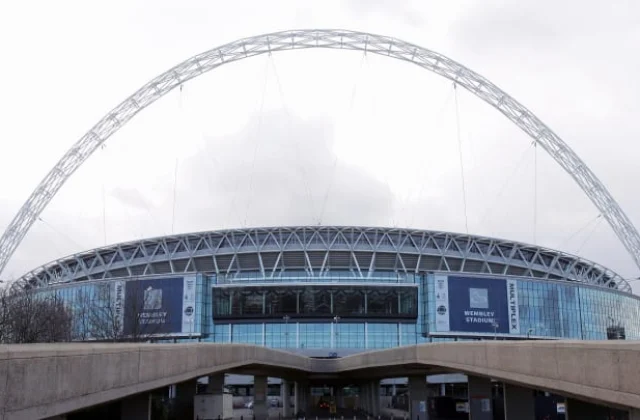 Manchester City and Spurs fans participate in the Carabao Cup final