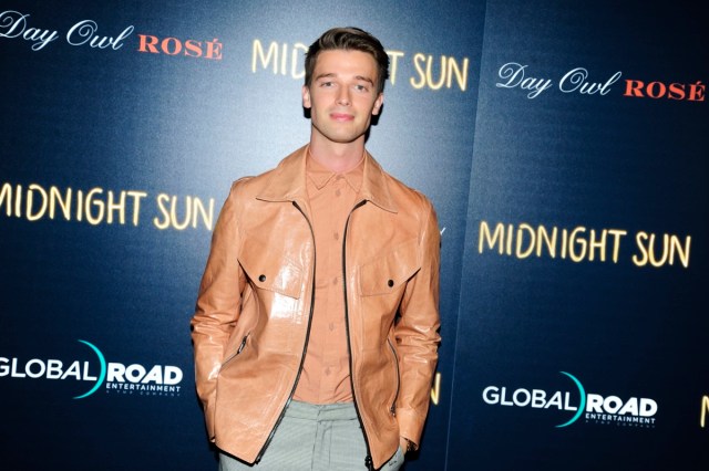 patrick schwarzenegger in tan leather jacket on red carpet