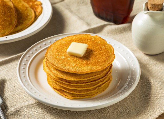 stack of cornmeal johnnycakes with butter