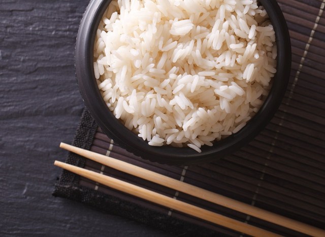 white rice and chopsticks