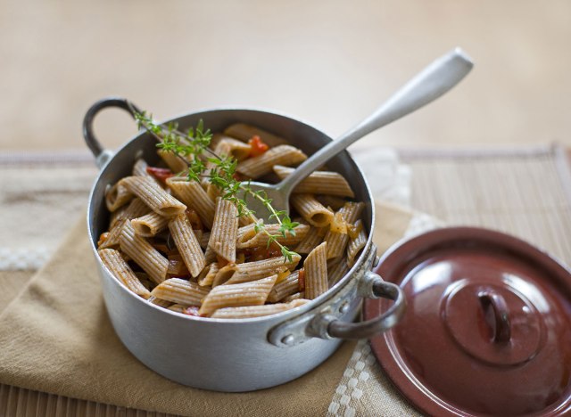 boiled and seasoned whole wheat pasta in the pan