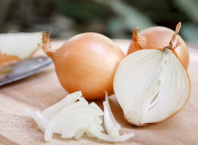 chopped onions on a cutting board