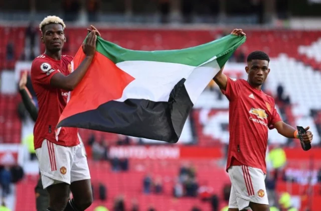 Muslimiinta Manchester United Ee Paul Pogba Iyo Amad Diallo Oo Garab