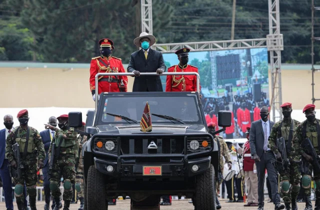 Yoweri Museveni exhibits his file beneath