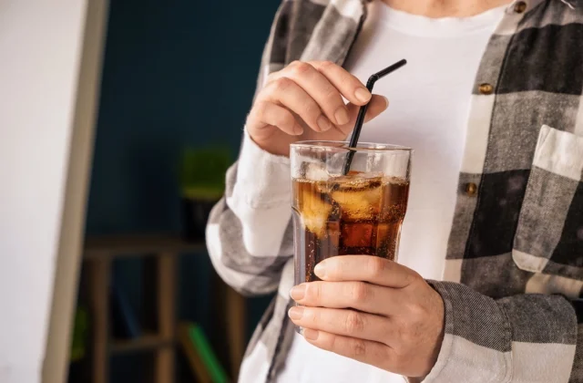 One Major Side Effect of Drinking Too Much Soda, Says Science